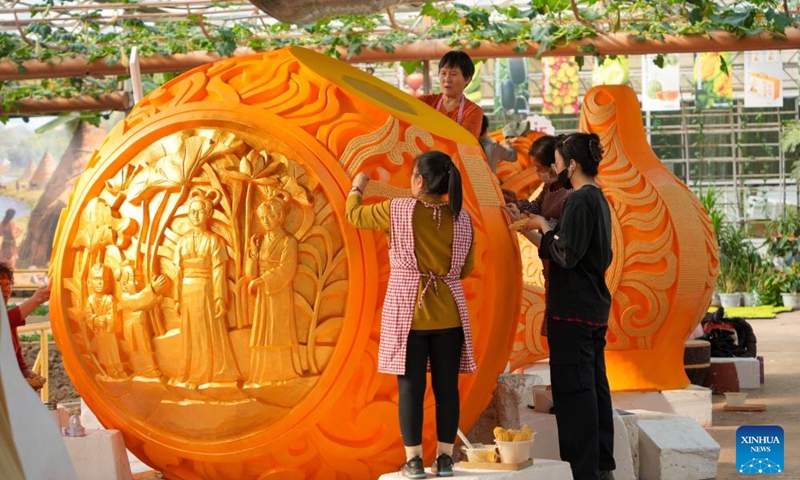 Staff members work at the venue of the upcoming 27th China (Shouguang) International Vegetable Science and Technology Expo in Shouguang, east China's Shandong Province, April 1, 2026. The 27th China (Shouguang) International Vegetable Science and Technology Expo has entered its final stage of preparation. Scheduled from April 20 to May 30, this year's expo will showcase over 2,600 varieties of vegetables. (Xinhua/Xu Suhui)

