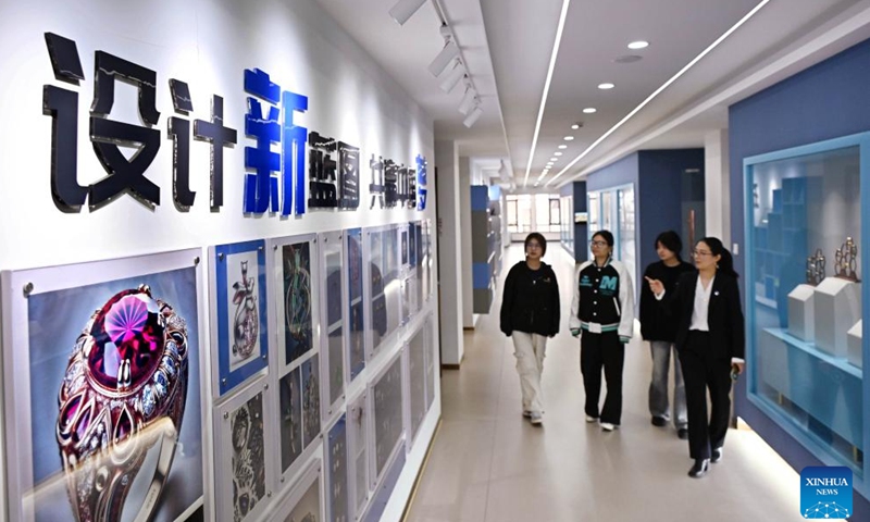 Jewelry design works by teachers and students are displayed at Qingdao Preschool Education College in Qingdao, east China's Shandong Province, March 31, 2026. (Xinhua/Li Ziheng)