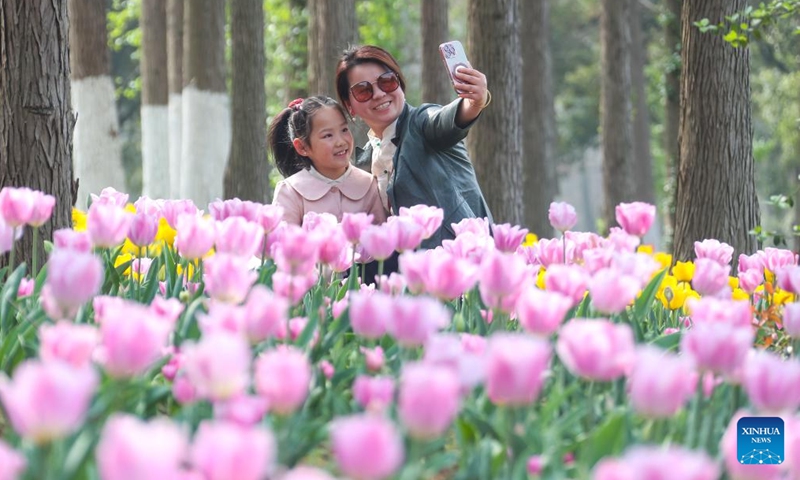 People enjoy the spring break at an agricultural expo park in Jurong, east China's Jiangsu Province, April 1, 2026. As spring blossoms across China, primary and secondary school students in several regions are set for their first-ever spring break, which will see them heading beyond the classroom to travel and engage in a wide range of activities. (Photo by Zhong Xueman/Xinhua)

