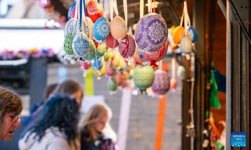 Festive decorations are pictured at an Easter market in Prague, the Czech Republic, April 2, 2026. As Easter approaches, a market is held in Prague's old city, attracting residents and tourists to experience the festive atmosphere. (Photo by Dana Kesnerova/Xinhua)