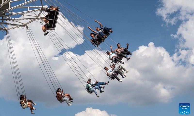 Visitors take an amusement ride during the Rand Show 2026 in Johannesburg, South Africa, April 2, 2026. The Rand Show, an annual entertainment and shopping extravaganza in South Africa, is held from April 2 to 6 at the Johannesburg Expo Center. (Photo by Shiraaz Mohamed/Xinhua)