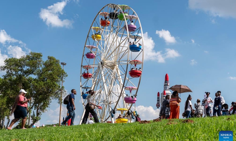 Visitors take an amusement ride during the Rand Show 2026 in Johannesburg, South Africa, April 2, 2026. The Rand Show, an annual entertainment and shopping extravaganza in South Africa, is held from April 2 to 6 at the Johannesburg Expo Center. (Photo by Shiraaz Mohamed/Xinhua)