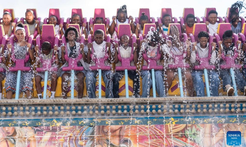 Visitors take an amusement ride during the Rand Show 2026 in Johannesburg, South Africa, April 2, 2026. The Rand Show, an annual entertainment and shopping extravaganza in South Africa, is held from April 2 to 6 at the Johannesburg Expo Center. (Photo by Shiraaz Mohamed/Xinhua)