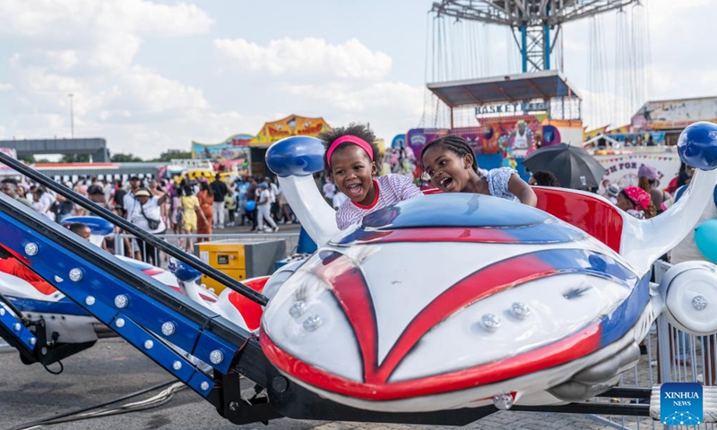 Children take an amusement ride during the Rand Show 2026 in Johannesburg, South Africa, April 2, 2026. The Rand Show, an annual entertainment and shopping extravaganza in South Africa, is held from April 2 to 6 at the Johannesburg Expo Center. (Photo by Shiraaz Mohamed/Xinhua)