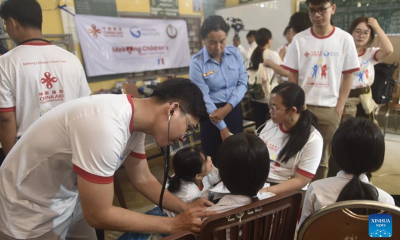 Health workers check heart's health for students at a primary school in Kampot, Cambodia, April 2, 2026. (Xinhua/Wu Changwei)

