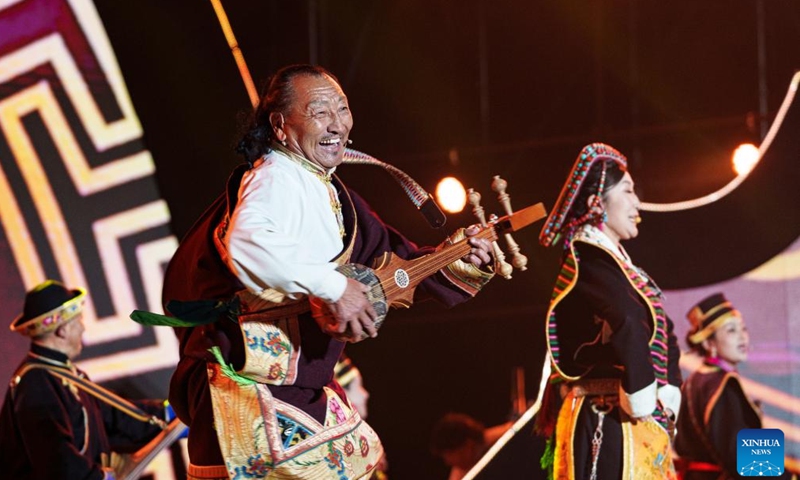 People perform at the opening ceremony of a peach blossom tourism and cultural festival in Nyingchi, southwest China's Xizang Autonomous Region, April 3, 2026. A peach blossom tourism and cultural festival kicked off in Nyingchi on Friday. More than 20 activities are scheduled to be held during the event. (Xinhua/Tenzin Nyida)