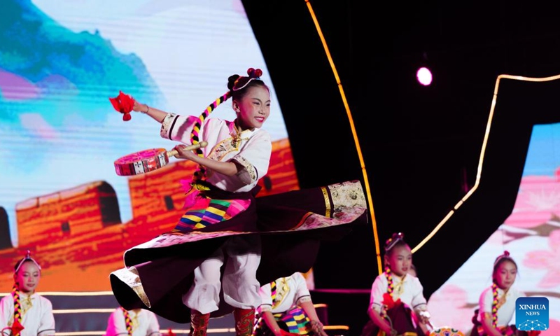 Children perform at the opening ceremony of a peach blossom tourism and cultural festival in Nyingchi, southwest China's Xizang Autonomous Region, April 3, 2026. A peach blossom tourism and cultural festival kicked off in Nyingchi on Friday. More than 20 activities are scheduled to be held during the event. (Xinhua/Tenzin Nyida)