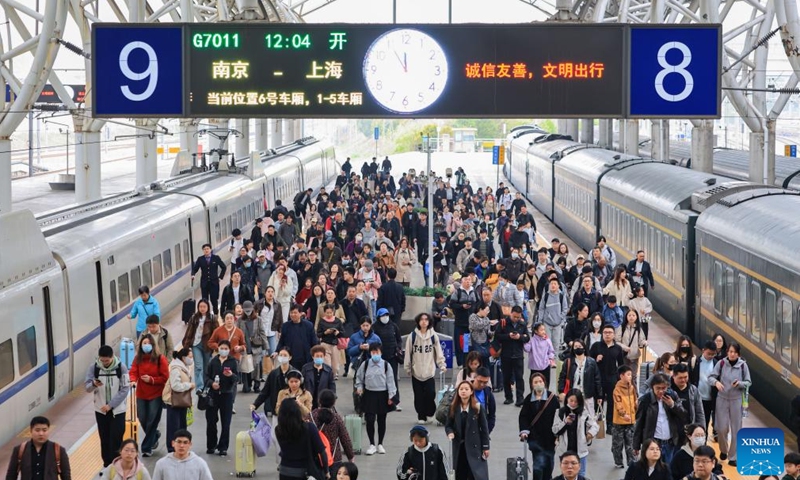 Passengers are seen at a platform of Nanjing Railway Station in Nanjing, east China's Jiangsu Province, April 3, 2026. (Photo by Su Yang/Xinhua)