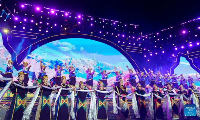 People perform at the opening ceremony of a peach blossom tourism and cultural festival in Nyingchi, southwest China's Xizang Autonomous Region, April 3, 2026. A peach blossom tourism and cultural festival kicked off in Nyingchi on Friday. More than 20 activities are scheduled to be held during the event. (Xinhua/Tenzin Nyida)