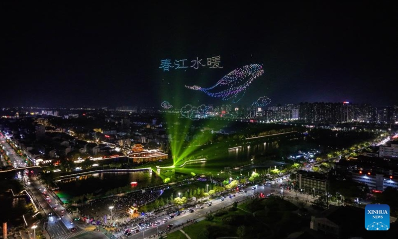 A drone show is held near the Jingzhou ancient city in Jingzhou, central China's Hubei Province, April 3, 2026. The performance aiming at boosting spring cultural tourism was staged here on the evening of Friday, attracting lots of visitors. (Photo by Wu Taotao/Xinhua)