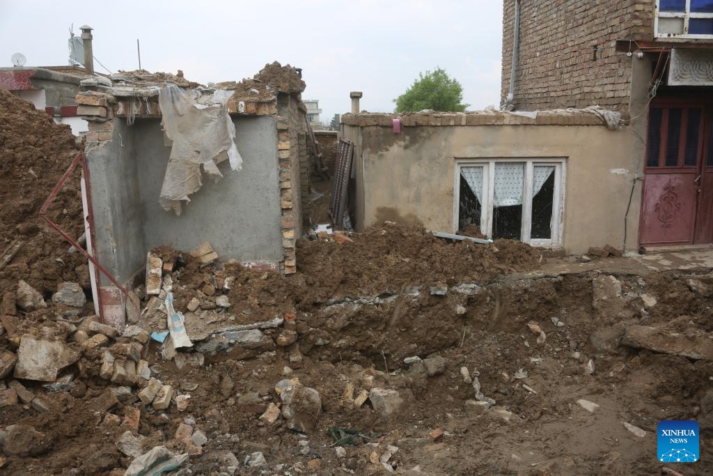 This photo taken on April 5, 2026 shows a building that has collapsed during heavy rains in Kabul, capital of Afghanistan. The death toll from heavy rainfall-triggered flooding across Afghanistan has risen to at least 99 people, with 154 others injured over the past nine days, a spokesman for the National Disaster Management Authority said on Sunday. (Photo by Saifurahman Safi/Xinhua)