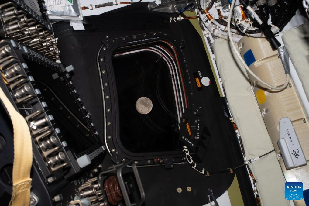 Photo taken on April 6, 2026 shows the Moon seen from the Orion spacecraft. The crew of the Artemis II mission on Monday broke the record for the farthest distance from Earth ever traveled by humans, surpassing the milestone achieved by Apollo 13 in April 1970, according to NASA. (NASA/Handout via Xinhua)