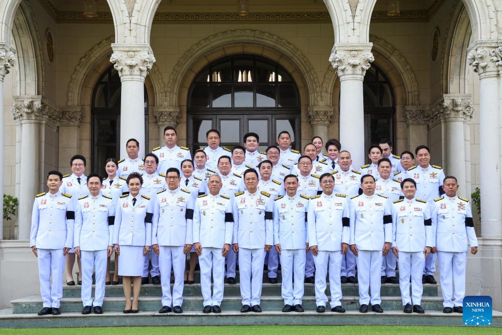 Thai Prime Minister Anutin Charnvirakul and new cabinet ministers pose for a group photo at the Government House in Bangkok, capital of Thailand, April 6, 2026. Thailand's new coalition government led by Prime Minister Anutin Charnvirakul was sworn into office on Monday evening, following a royal endorsement last week. (Xinhua/Rachen Sageamsak)
