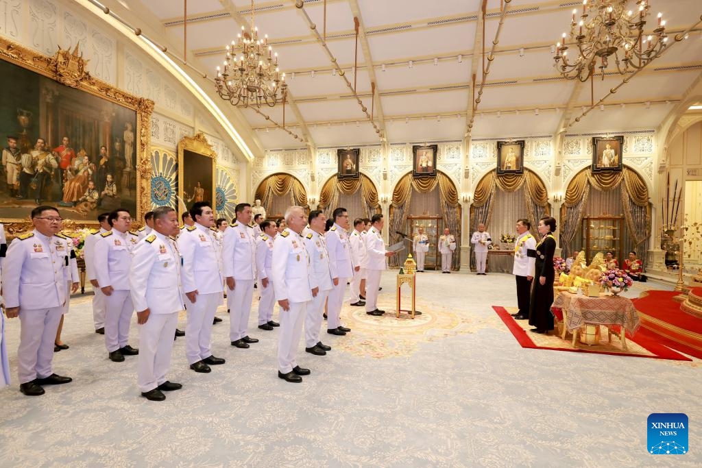Thai Prime Minister Anutin Charnvirakul and new cabinet ministers take an oath in front of King Maha Vajiralongkorn at Dusit Palace in Bangkok, Thailand, April 6, 2026. Thailand's new coalition government led by Prime Minister Anutin Charnvirakul was sworn into office on Monday evening, following a royal endorsement last week. The 35-member cabinet recited the oath of allegiance before an audience with King Maha Vajiralongkorn in a traditional ceremony held in the Dusit Palace in Bangkok. (Bureau of the Royal Household/Handout via Xinhua)