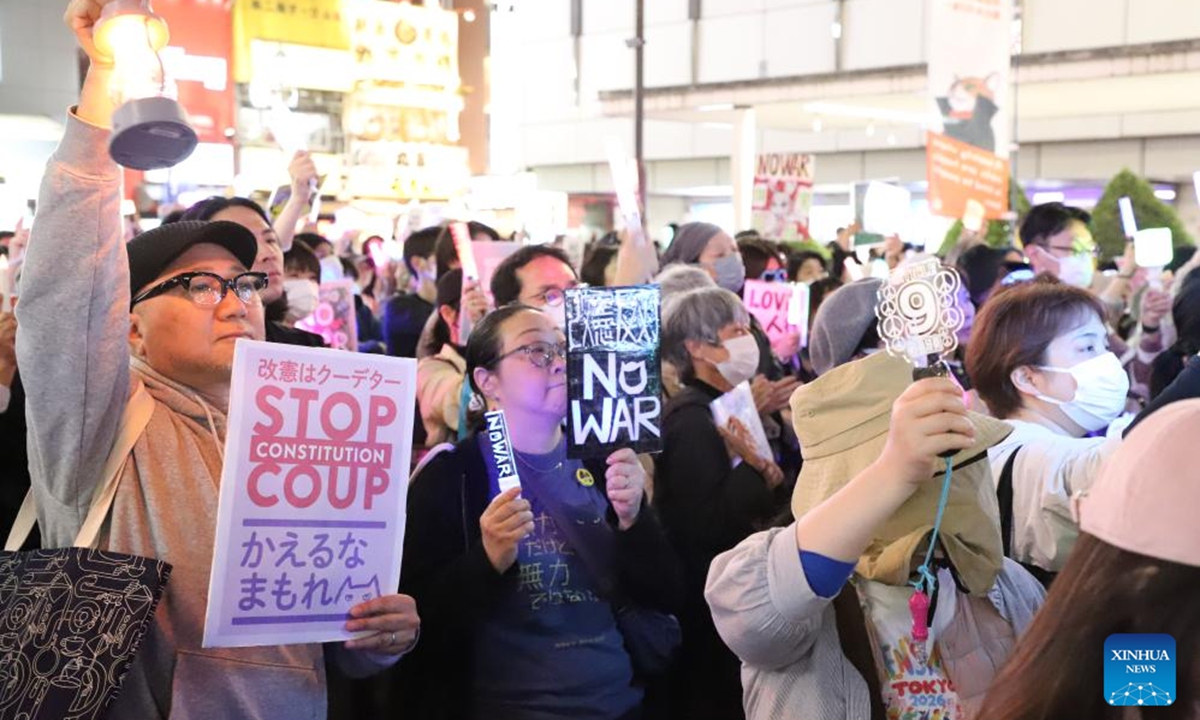 People participate in a protest outside the Ikebukuro station in Tokyo, Japan, on April 5, 2026. (Xinhua/Li Ziyue)