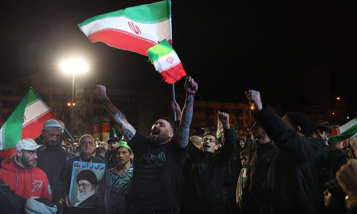 Iranian people in Tehran celebrate the reaching of the ceasefire agreement on April 8, 2026. Photo: VCG

