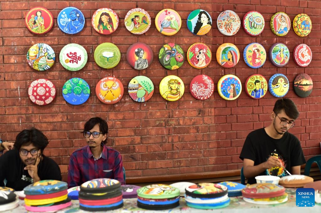Artists create artworks in preparation for the upcoming Bengali New Year, or Pahela Baishakh, at the Faculty of Fine Arts of University of Dhaka in Dhaka, Bangladesh, April 6, 2026. (Photo by Habibur Rahman/Xinhua)