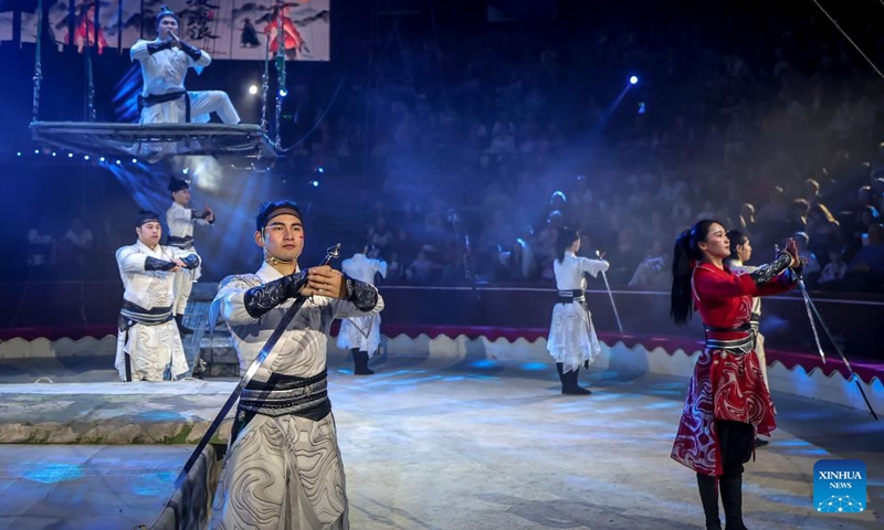 Members of China's Jiangsu Acrobatic Troupe perform in Soaring Above the Waves, an acrobatic act combining teeterboard, trampolines and a rocking platform, during the Ringlispil circus show at the Capital Circus of Budapest in Budapest, Hungary, April 8, 2026. Featuring acrobatic masters from various countries, the Ringlispil circus show takes place here from April 4 to 12. (Photo by David Balogh/Xinhua)