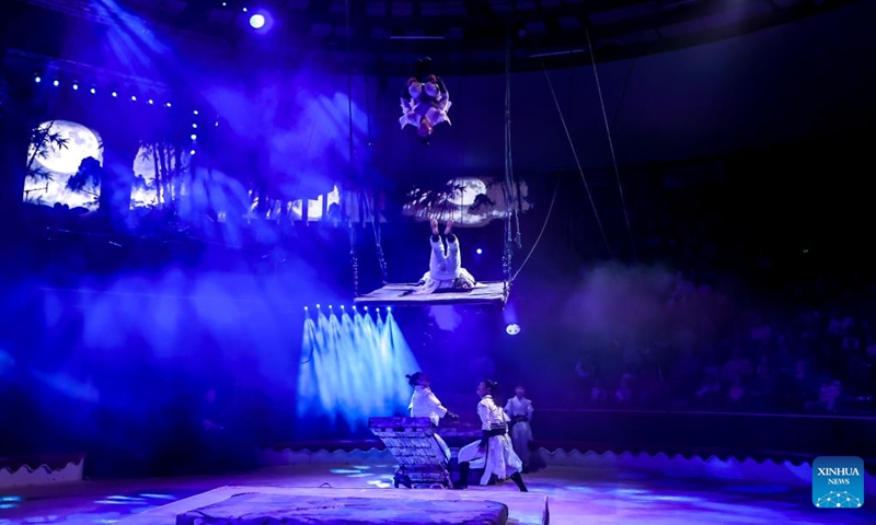 Members of China's Jiangsu Acrobatic Troupe perform in Soaring Above the Waves, an acrobatic act combining teeterboard, trampolines and a rocking platform, during the Ringlispil circus show at the Capital Circus of Budapest in Budapest, Hungary, April 8, 2026. Featuring acrobatic masters from various countries, the Ringlispil circus show takes place here from April 4 to 12. (Photo by David Balogh/Xinhua)