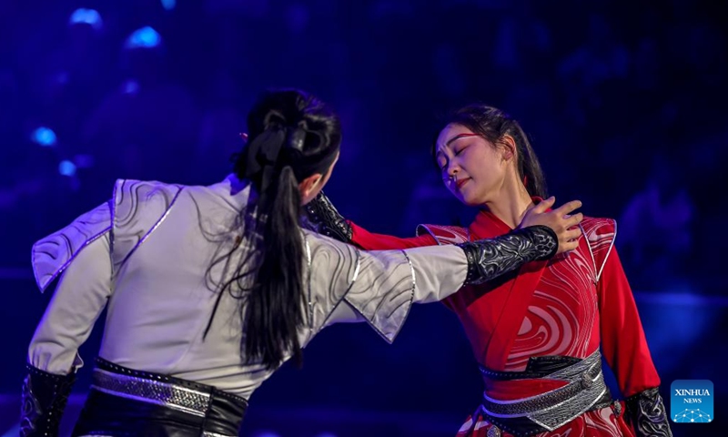 Members of China's Jiangsu Acrobatic Troupe perform in Soaring Above the Waves, an acrobatic act combining teeterboard, trampolines and a rocking platform, during the Ringlispil circus show at the Capital Circus of Budapest in Budapest, Hungary, April 8, 2026. Featuring acrobatic masters from various countries, the Ringlispil circus show takes place here from April 4 to 12. (Photo by David Balogh/Xinhua)