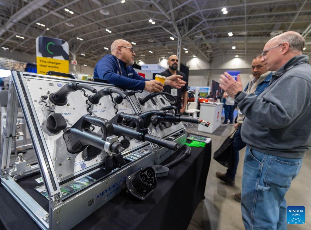 Participants visit the EV & Charging Expo 2026 in Toronto, Canada, on April 8, 2026. Exploring electric vehicles and charging solutions for fleets, buildings and commercial sites, the two-day event kicked off here on Wednesday, with about 2,000 attendees from more than 800 organizations. (Photo by Zou Zheng/Xinhua)

