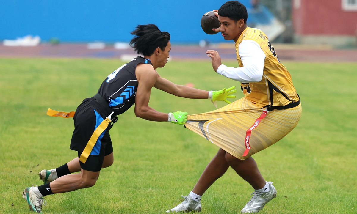 Players compete in a flag football match between Chinese and US youths in Beijing on April 9, 2026. More than 150 youth athletes and representatives from across the US will attend a commemorative conference to be held in Beijing on April 10, and witness the official launch of the 2026 China-US Youth Sports Exchange Series, as this year marks the 55th anniversary of China-US 