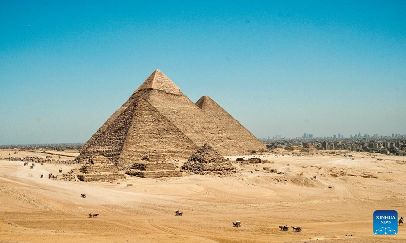 This photo taken on April 9, 2026 shows the Giza Pyramids scenic spot in Giza, Egypt. The Giza Pyramids located southwest of Cairo, capital of Egypt, are one of the most representative sites of ancient Egyptian civilization. The complex includes the three pyramids known as the Great Pyramids, the massive sculpture known as the Great Sphinx, and several ancient cemeteries and smaller pyramids. The pyramids are part of a UNESCO World Heritage Site inscribed in 1979. (Xinhua/Xin Mengchen)
