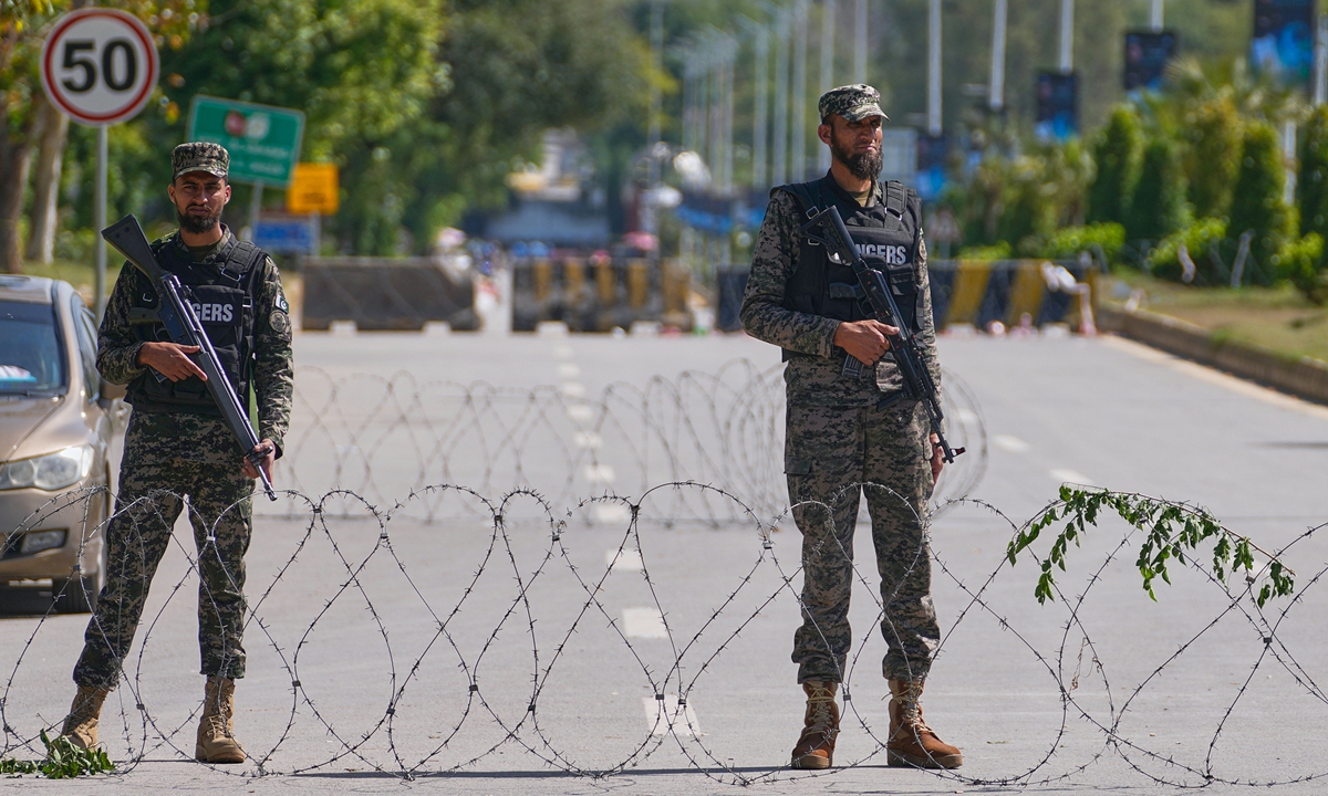 Soldiers stand guard at a checkpoint to ensure security ahead of the United States and Iran possible negotiations in Pakistani capital, in Islamabad, Pakistan, Friday, April 10, 2026. Photo:VCG