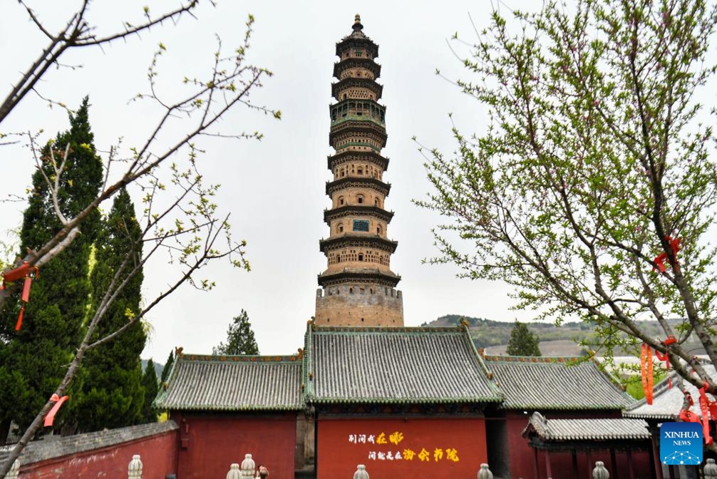 This photo taken on April 8, 2026 shows a view of the colored glazed tower at Haihui Academy scenic area in Jincheng City, north China's Shanxi Province. Situated on north China's Taihang Mountain, the Haihui Academy scenic area is famous for its twin towers. (Xinhua/Cao Yang)