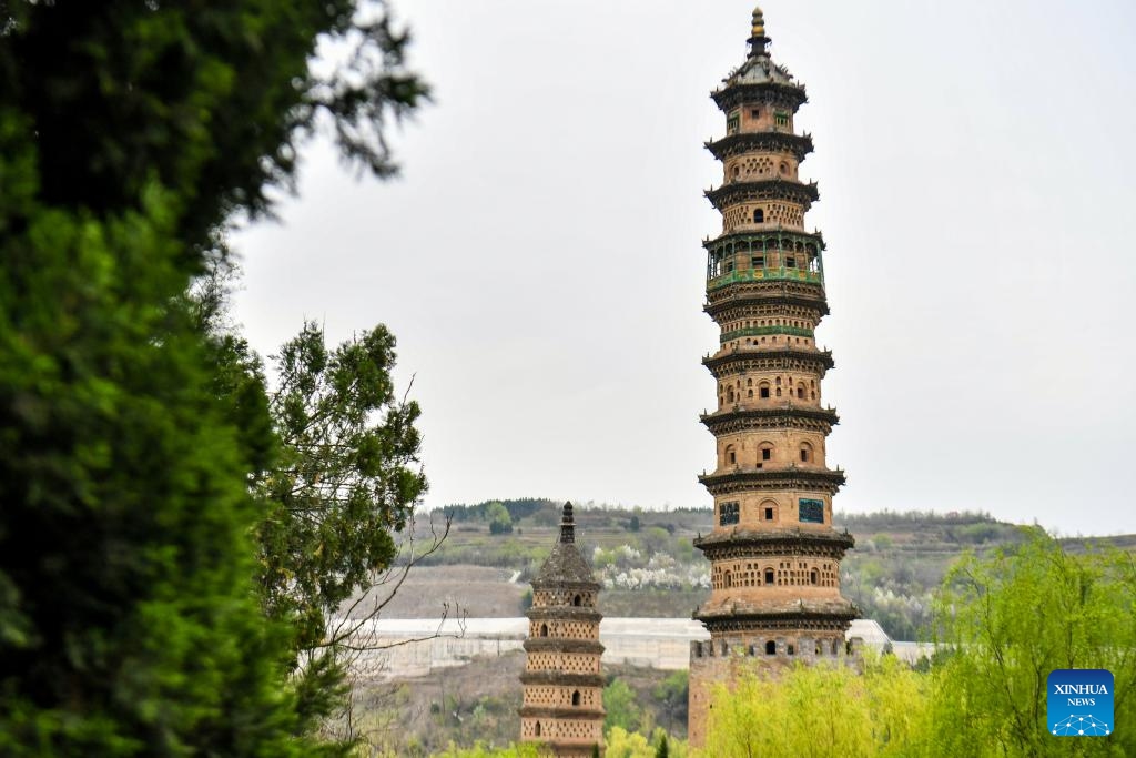 This photo taken on April 8, 2026 shows a view of the twin towers at Haihui Academy scenic area in Jincheng City, north China's Shanxi Province. Situated on north China's Taihang Mountain, the Haihui Academy scenic area is famous for its twin towers. (Xinhua/Cao Yang)