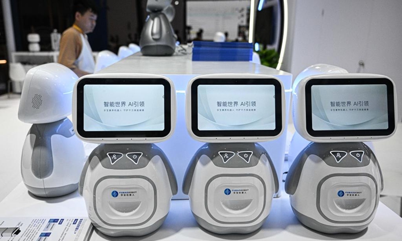 Health and companionship robots are pictured at the Hainan International Convention and Exhibition Center, the main venue for the upcoming sixth China International Consumer Products Expo (CICPE), in Haikou, south China's Hainan Province, April 11, 2026. Scheduled to take place in south China's Hainan Province from April 13 to 18, this expo will see the participation of more than 3,400 brands from over 60 countries and regions. Photo: Xinhua