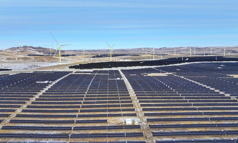 An aerial drone photo taken on Dec. 10, 2025 shows wind power and photovoltaic power generation equipment in Holingol, north China's Inner Mongolia Autonomous Region. (Photo by Wang Chenxi/Xinhua)