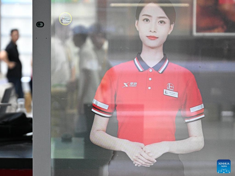 A digital employee of China Petrochemical Corporation (Sinopec) is pictured at the Hainan International Convention and Exhibition Center, the main venue for the upcoming sixth China International Consumer Products Expo (CICPE), in Haikou, south China's Hainan Province, April 11, 2026. Scheduled to take place in south China's Hainan Province from April 13 to 18, this expo will see the participation of more than 3,400 brands from over 60 countries and regions. Photo: Xinhua