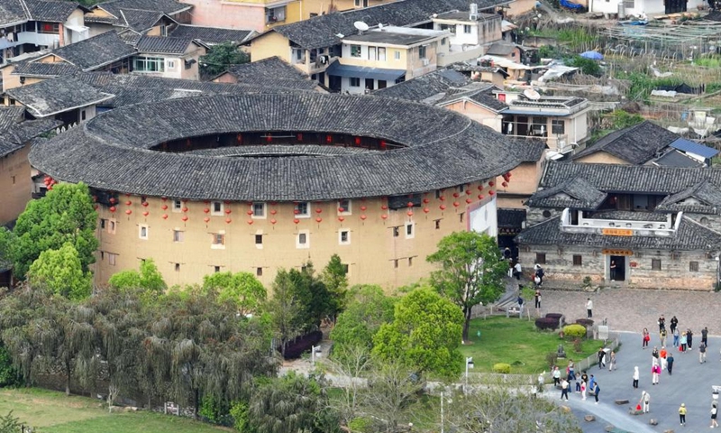 An aerial drone photo taken on April 9, 2026 shows Huaiyuanlou in Nanjing County, southeast China's Fujian Province. Tulou, the unique residential architecture of Fujian Province, was inscribed on the UNESCO's World Heritage List in 2008. In recent years, local authorities has continued promoting Tulou protection, revitalization, and integration with tourism. (Xinhua/Lin Shanchuan)