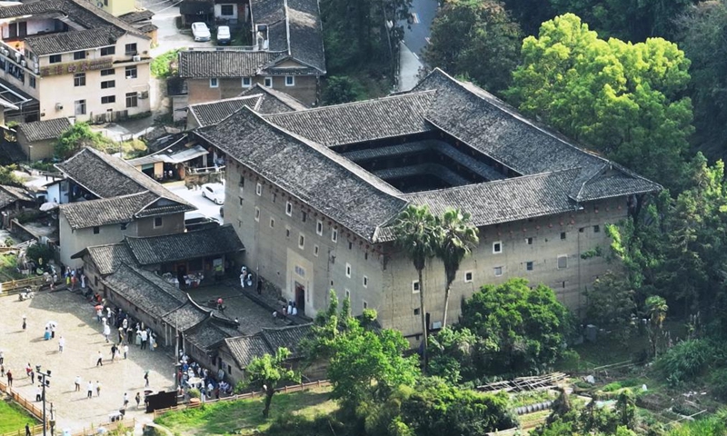 An aerial drone photo taken on April 9, 2026 shows Heguilou in Nanjing County, southeast China's Fujian Province. Tulou, the unique residential architecture of Fujian Province, was inscribed on the UNESCO's World Heritage List in 2008. In recent years, local authorities has continued promoting Tulou protection, revitalization, and integration with tourism. (Xinhua/Lin Shanchuan)