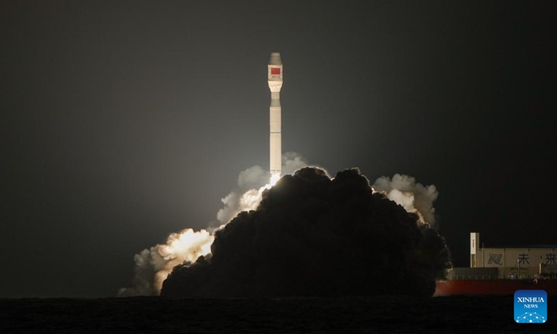 A Smart Dragon-3 (SD-3) carrier rocket carrying a test satellite blasts off from waters off the coast of Yangjiang in south China's Guangdong Province, April 11, 2026. China on Saturday launched a SD-3 carrier rocket from the sea, sending a test satellite into its planned orbit to promote satellite internet technology. The SD-3 rocket blasted off at 7:32 p.m. (Beijing Time) from waters off the coast of Yangjiang in south China's Guangdong Province. (Photo by Guo Jinqi/Xinhua)