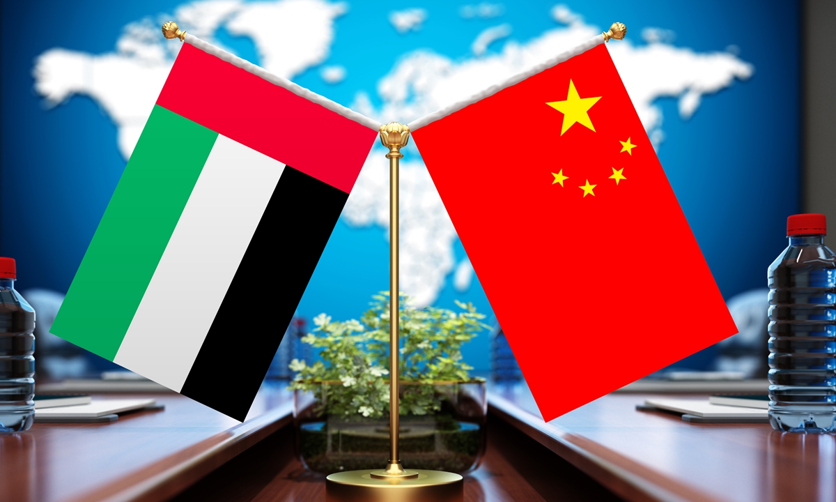 National flag of China and flag of the United Arab Emirates Photo: VCG