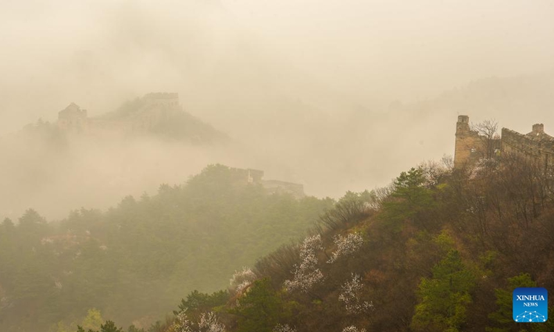 This photo taken on April 9, 2026 shows a view of Jinshanling section of the Great Wall after rain in Luanping County, Chengde City of north China's Hebei Province. (Photo by Zhou Wanping/Xinhua)