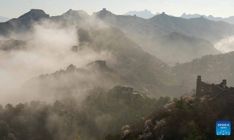 This photo taken on April 10, 2026 shows a view of Jinshanling section of the Great Wall after rain in Luanping County, Chengde City of north China's Hebei Province. (Photo by Zhou Wanping/Xinhua)