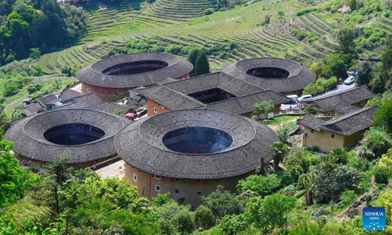 This photo taken on April 9, 2026 shows Tianluokeng Tulou cluster in Nanjing County, southeast China's Fujian Province. Tulou, the unique residential architecture of Fujian Province, was inscribed on the UNESCO's World Heritage List in 2008. In recent years, local authorities has continued promoting Tulou protection, revitalization, and integration with tourism. (Xinhua/Lin Shanchuan)