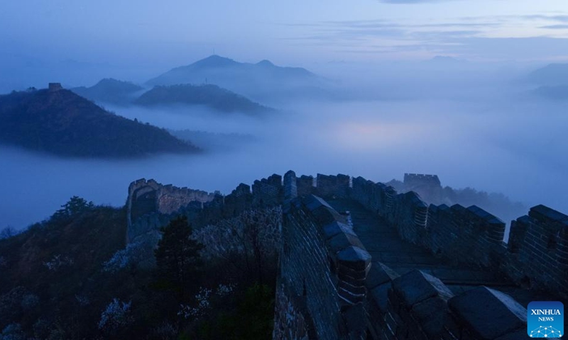 This photo taken on April 10, 2026 shows a view of Jinshanling section of the Great Wall after rain in Luanping County, Chengde City of north China's Hebei Province. (Photo by Zhou Wanping/Xinhua)