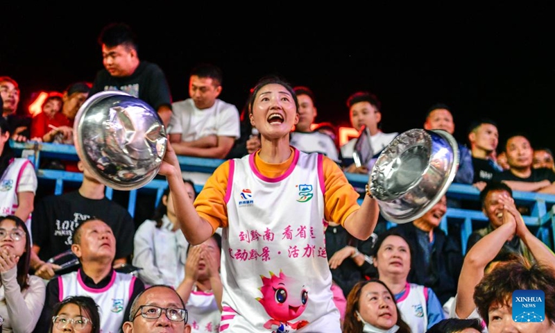 Fans cheer during the final match between Kaili City and Yanhe County at the 2026 China's Village Basketball Competition in Taipan Village, Taijiang County, southwest China's Guizhou Province, April 11, 2026. (Xinhua/Yang Wenbin)