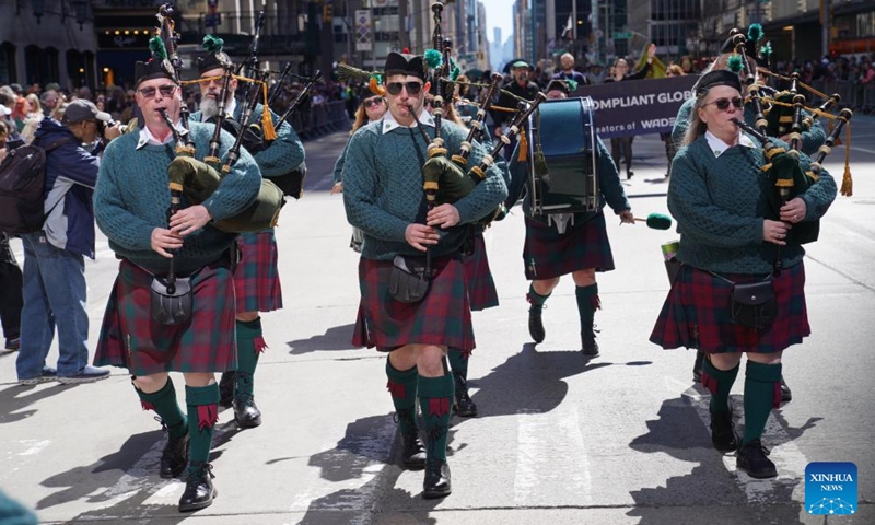 Bagpipers march during the annual Tartan Day Parade in New York, the United States, on April 11, 2026. More than 3,000 bagpipers, highland dancers and other participants marched to celebrate the annual Tartan Day here on Saturday. The event was held to mark the existing and historical links between Scotland and Scottish descendants in the U.S.. (Xinhua/Zhang Fengguo)