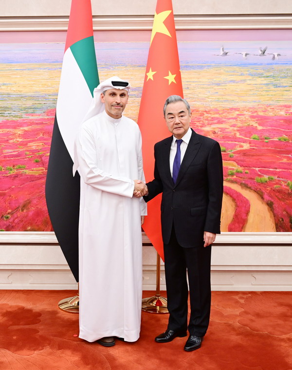 Chinese Foreign Minister Wang Yi meets with Khaldoon Khalifa Al Mubarak, special envoy of the president of the United Arab Emirates (UAE) in Beijing on April 13. Photo: Chinese Foreign Ministry's official website