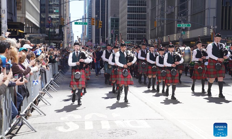 Bagpipers march during the annual Tartan Day Parade in New York, the United States, on April 11, 2026. More than 3,000 bagpipers, highland dancers and other participants marched to celebrate the annual Tartan Day here on Saturday. The event was held to mark the existing and historical links between Scotland and Scottish descendants in the U.S.. (Xinhua/Zhang Fengguo)