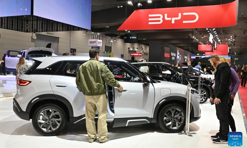 People visit the BYD stand during the 2026 Melbourne Motor Show in Melbourne, Australia, April 10, 2026. (Xinhua/Xu Haijing)