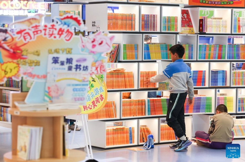Children read books at a bookstore in Shijiazhuang City, north China's Hebei Province, April 12, 2026. (Photo by Liang Zidong/Xinhua)