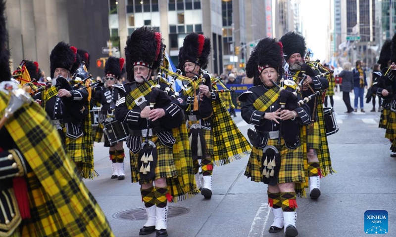 Bagpipers march during the annual Tartan Day Parade in New York, the United States, on April 11, 2026. More than 3,000 bagpipers, highland dancers and other participants marched to celebrate the annual Tartan Day here on Saturday. The event was held to mark the existing and historical links between Scotland and Scottish descendants in the U.S.. (Xinhua/Zhang Fengguo)