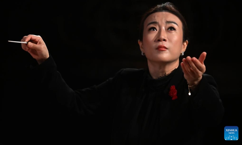 Jing Huan, principal conductor of the China National Symphony Orchestra, gestures at a concert celebrating the China-Brazil Cultural Year in Fortaleza, Ceara, Brazil, April 11, 2026. (Photo by Lucio Tavora/Xinhua)