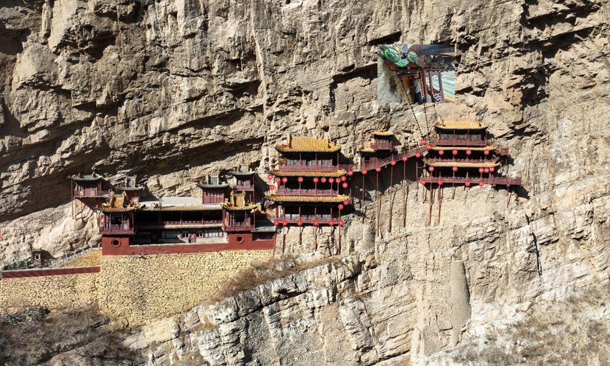Red markers indicate vibration sensors installed in the Hanging Temple for monitoring structural vibrations. Photo: Courtesy of the Shanxi Earthquake Agency